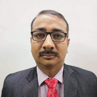 Dinesh M